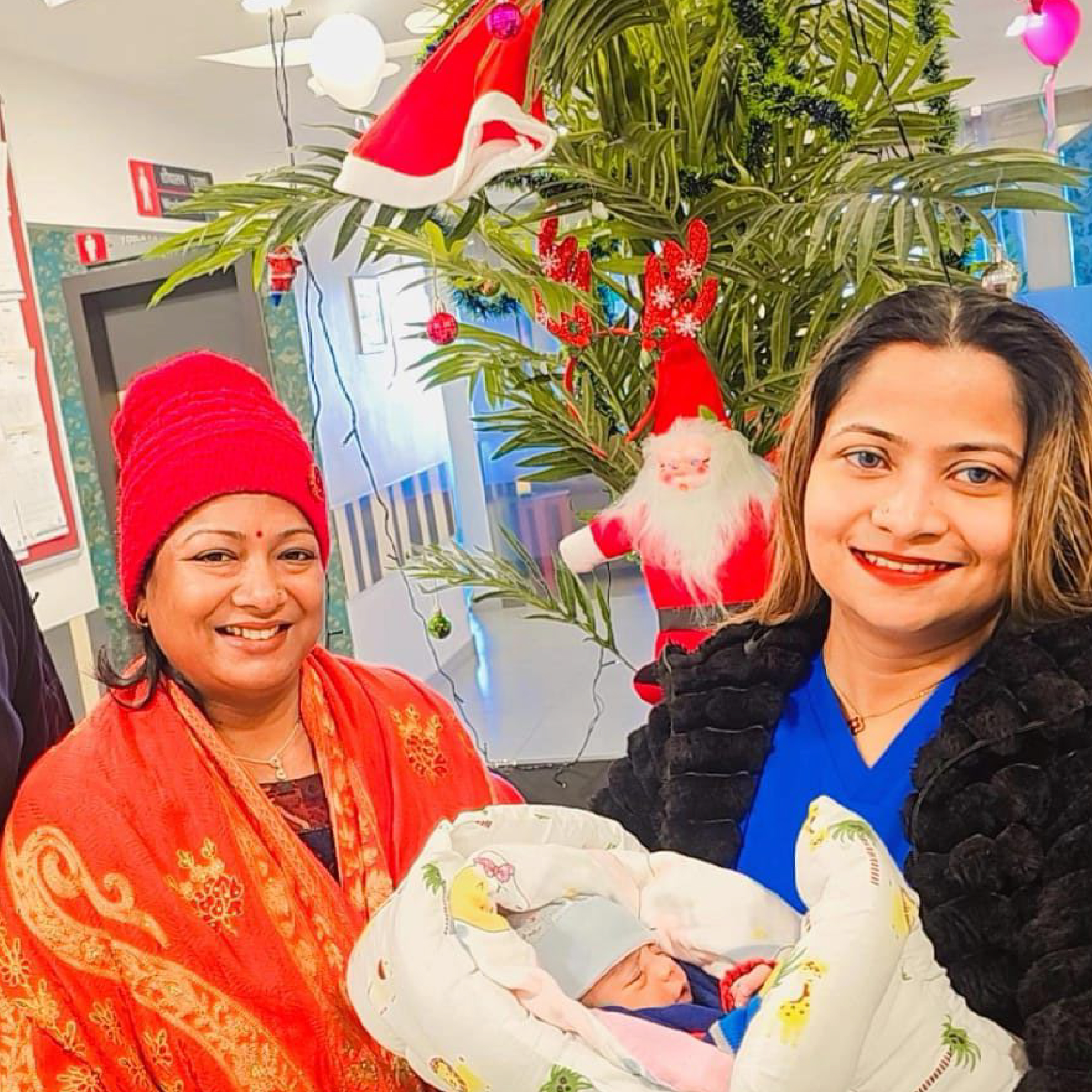 HomeIVF doctors, parents and grandparents holding a HomeIVF newborn baby