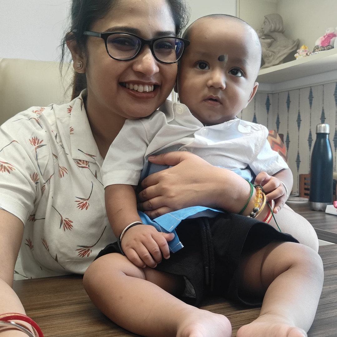 HomeIVF parents holding their newborn baby after a successful IVF cycle