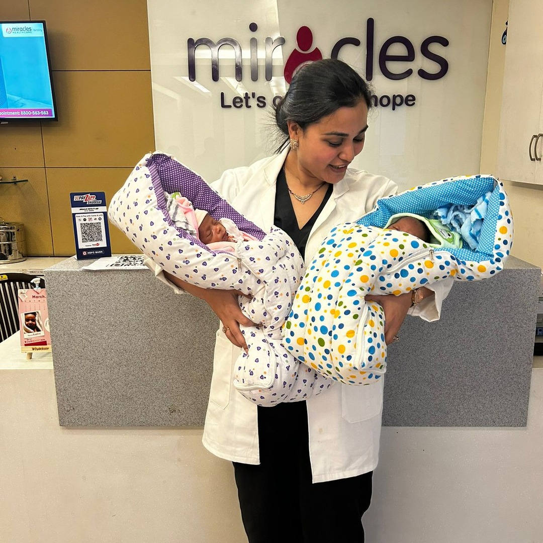 HomeIVF parents smiling with their newborn baby right after delivery